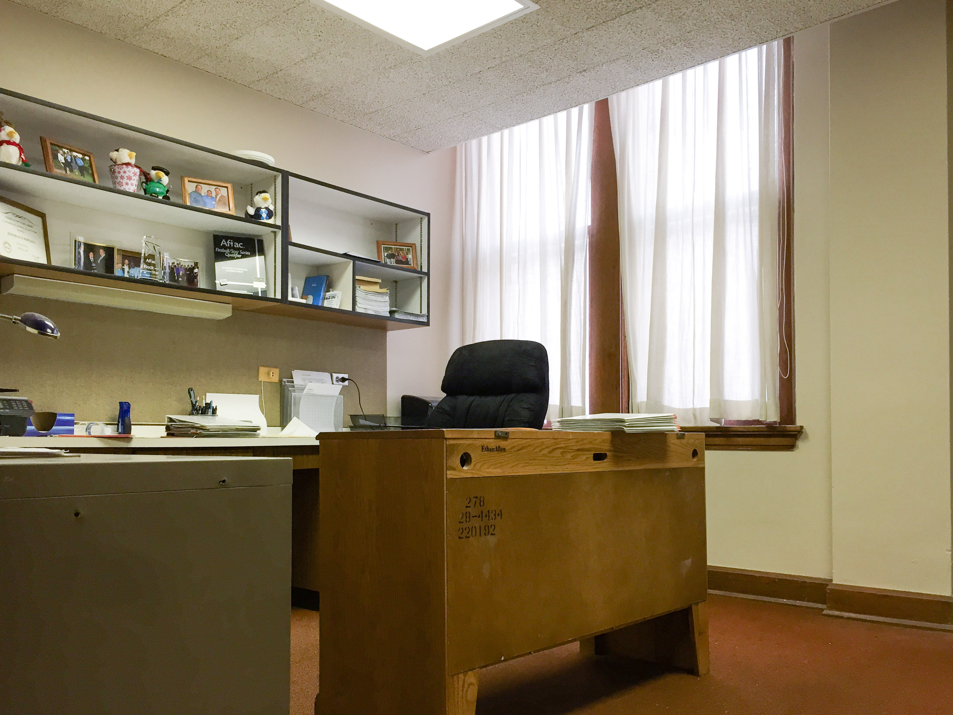 Office 231 has a built in desk and cabinets